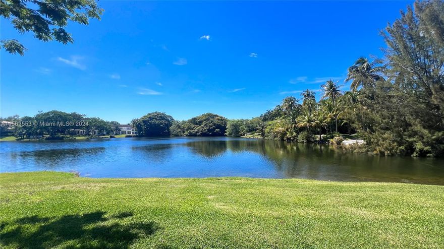 Paradise found in Snapper Creek Lakes! This sprawling 1.3 acre waterfront lot with expansive views of Elbow Lake invites you to build your dream home in one of Miami's most exclusive luxury neighborhoods. Snapper Creek Lakes is nestled within the lush greenery of south Coral Gables and offers a gated entrance with security guard and roving patrol, a private marina with ramp, fuel pump, clubhouse, and dockmaster.  A full set of plans for a single story home designed by the renowned Cesar Molina is available. This idyllic property is the perfect serene escape for the discerning buyer seeking privacy, elegance, and natural beauty. This is more than land—it’s an opportunity to build your legacy!