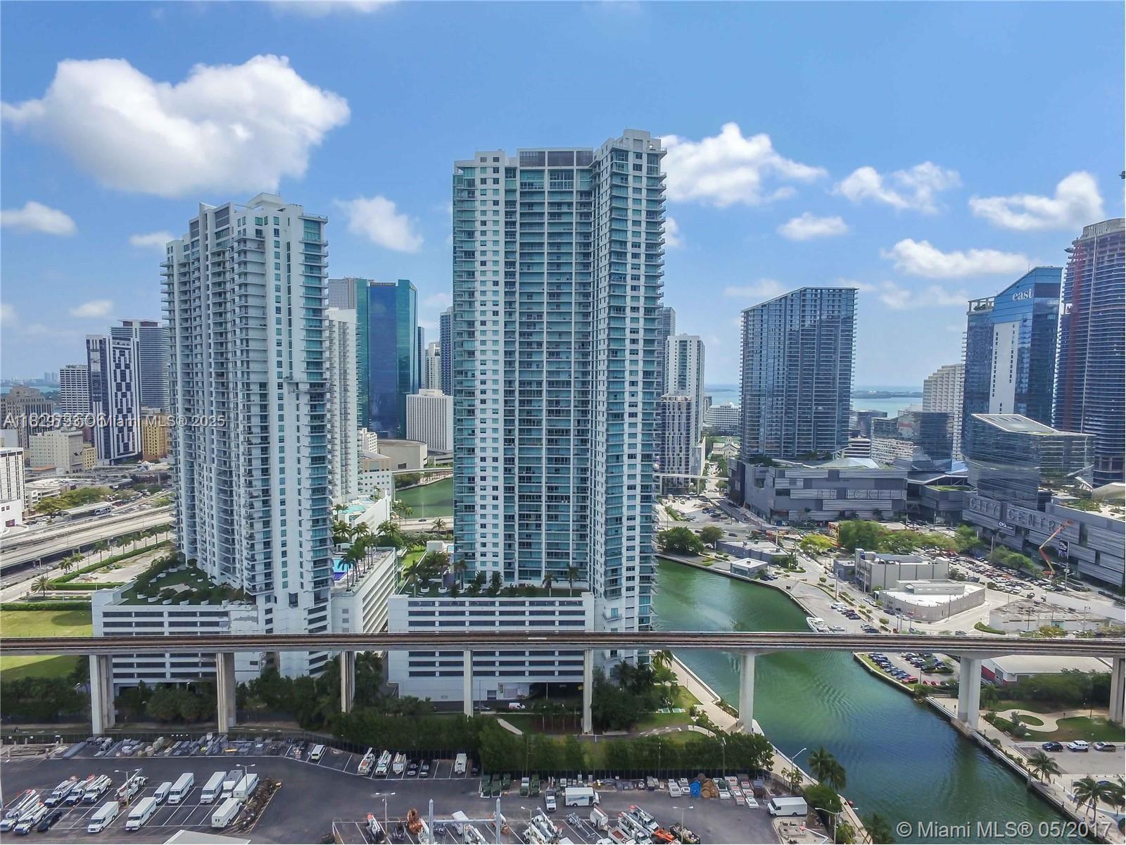 Beautiful 44th-floor 2-bedroom, 2.5-bathroom residence at Mint Condominium, offering the best views in the building. Expansive floor-to-ceiling windows frame stunning views of the river and city. Enjoy the luxury of two private balconies – one off the living area and the other off the master bedroom – both offering breathtaking vistas. The open-concept layout enhances the flow between the living and kitchen areas, providing abundant storage space. Building amenities include a state-of-the-art fitness center, resort-style pool, valet, spa, concierge, sauna, outdoor and indoor kids’ playgrounds, and a spacious outdoor dog park.