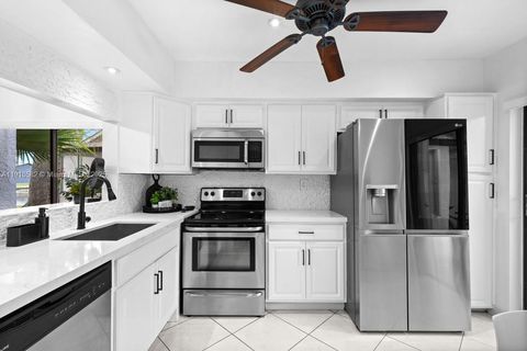 Photo of 6417 W Pinehurst Cir W #E23, Tamarac, FL 33321 (MLS # A11910582)