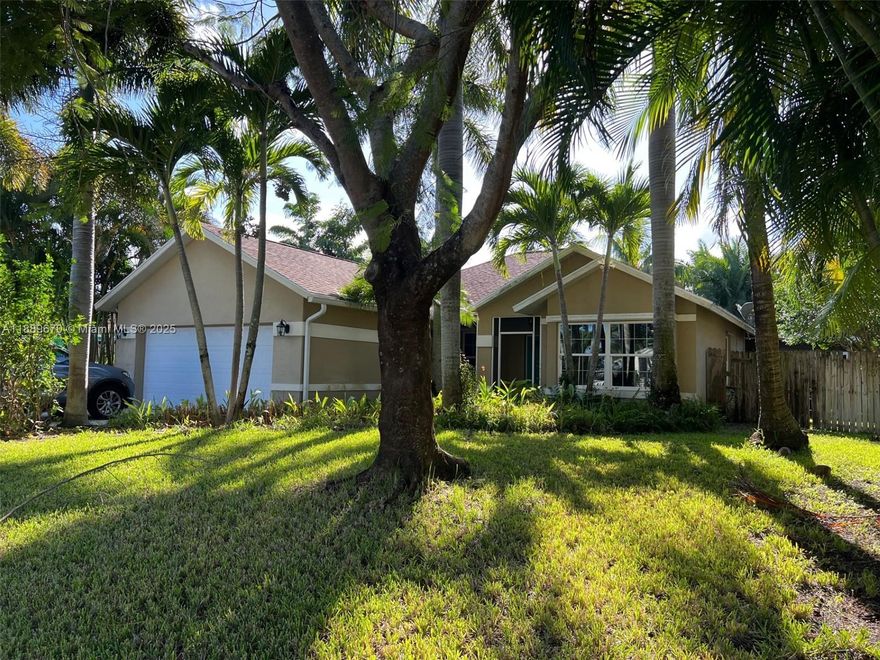 Minutes from the beach, this beautiful 4-bedroom 2 bath 2 car garage home with hurricane windows, private tranquil tropical backyard , screened in patio, and fully fenced in for privacy. Walk into cathedral cedar ceilings, open concept living and beautiful kitchen with granite countertops, stainless appliances and plenty of storage and breakfast bar. Home has a well forthe irrigation system. Great location and minutes to the beach, plenty of shopping and restaurants nearby.