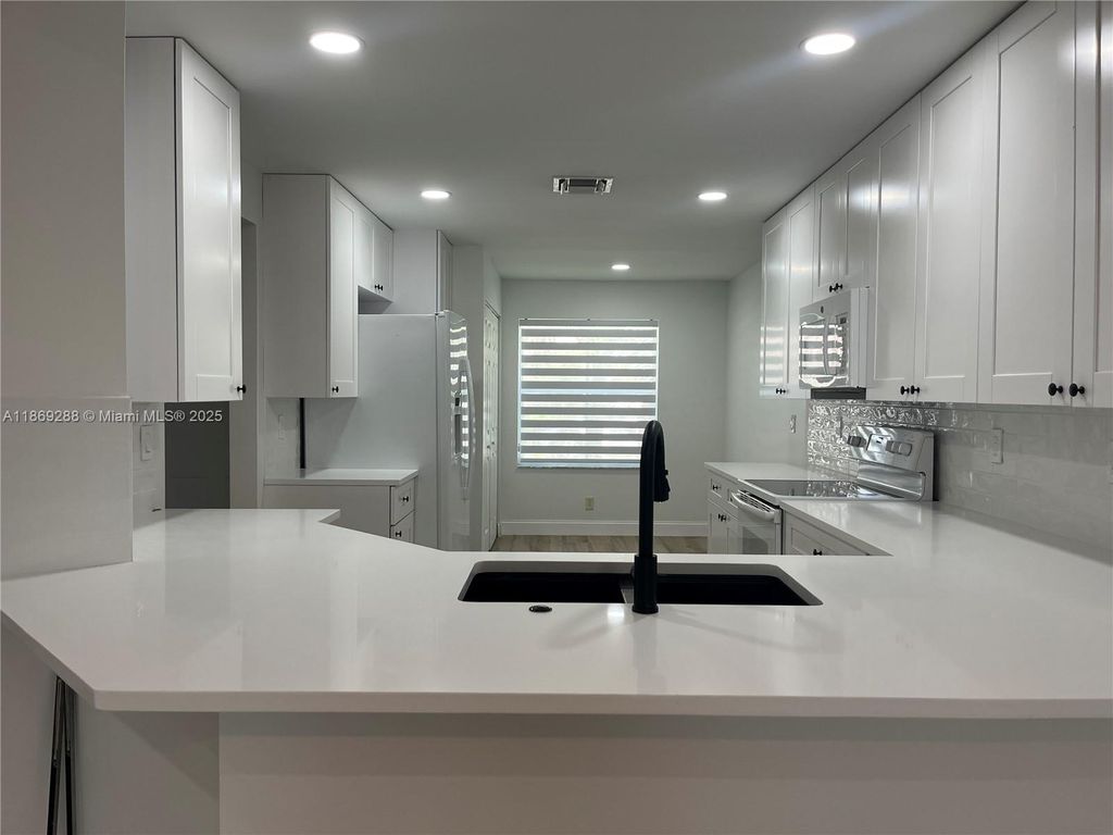 Photo of 1876 Andromeda Ln #1876, Weston, FL 33327 (MLS # A11869288)