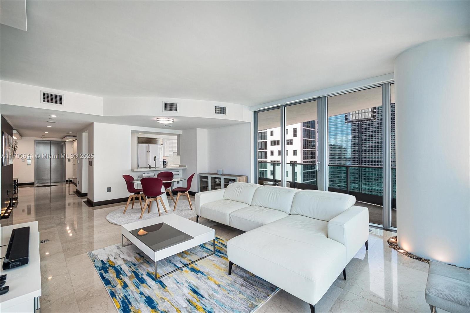 Step into luxury at The Jade in Brickell! This stunning corner unit offers breathtaking 180° city views and partial bay views, filling the space with natural light. With 1,529 sqft, this expansive 2-bedroom residence is larger than most and features a sophisticated open layout, private elevator foyer, and wraparound balconies.
The recently renovated kitchen is equipped with custom cabinetry, Miele & Liebherr appliances, and designer lighting, all seamlessly integrated into the Control4 system for smart automation of shades, lighting, and thermostat.
Experience the pinnacle of luxury, convenience, and smart living in one of Brickell’s most exclusive buildings. This unit also includes a private storage space, adding extra convenience to this exceptional residence.