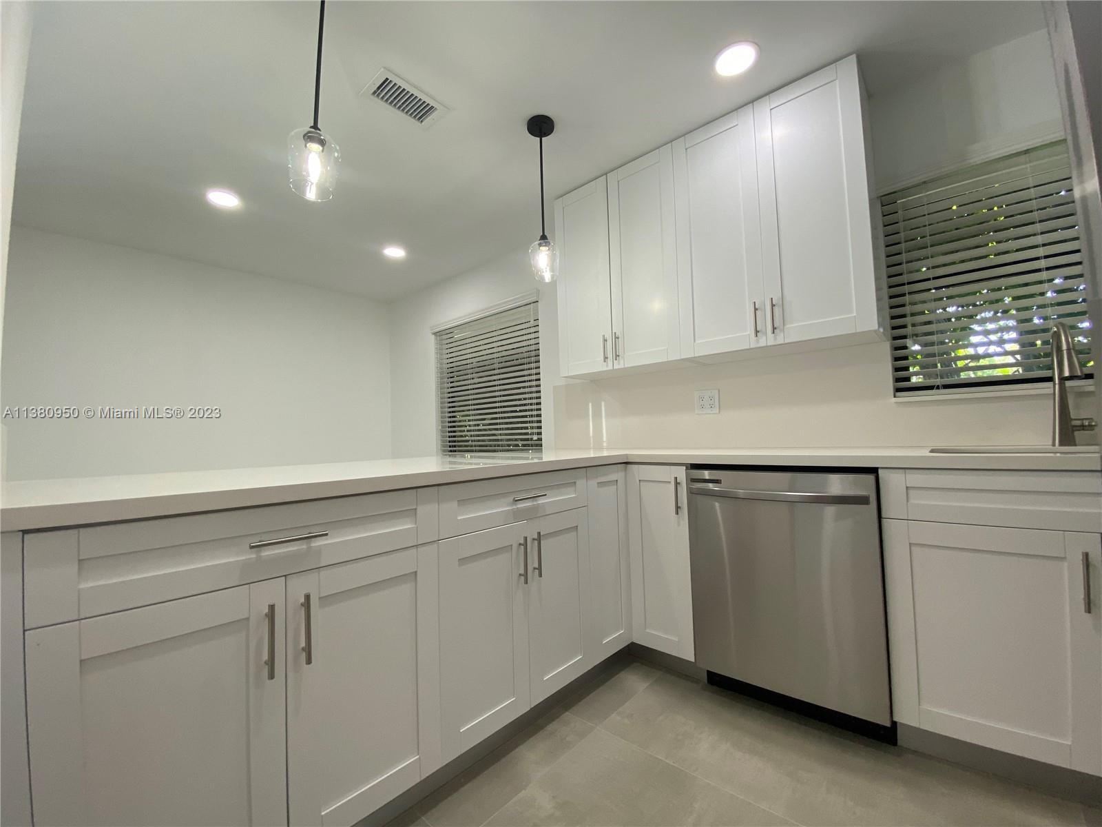 Look no further...you have found the place you will call home in this completely renovated first floor duplex! This 3 bedrooms/2 bath unit has the feel of a single-family home featuring tile floors throughout, kitchen with stainless steel appliances, master bathroom with a shower and bidet, washer and dryer in the unit, impact windows, large backyard and two parking spaces. Located in a coveted school area and within walking distance to Publix and all the restaurants and shops Miracle Mile and Coral Gables has to offer. See it ... love it ... sign a lease! No pets allowed.