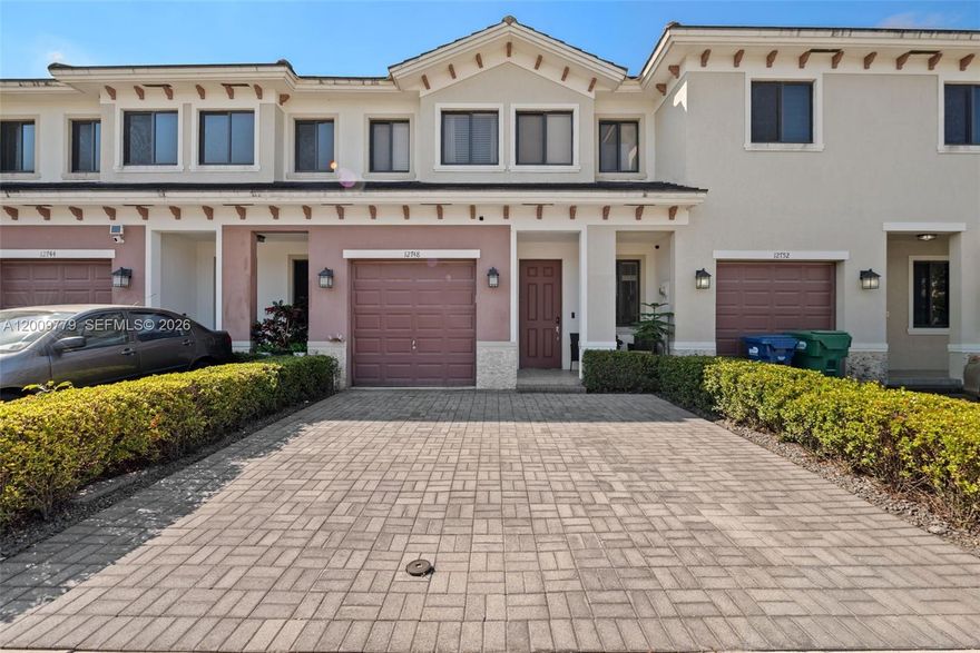 Elegant townhouse with 3 Beds and 2 1/2 Baths, featuring granite countertops and stainless steel appliances. Includes a generous one-car garage and a paved driveway. The garage has been transformed into a functional office space, but it can easily serve as a playroom or an extra bedroom. Ideally situated in a central area with convenient access to major highways and nearby shopping destinations. The backyard offers a charming rustic design with a covered canopy. Please note that the HOA requires approval for all purchase applications. Residents also enjoy access to a heated community pool.