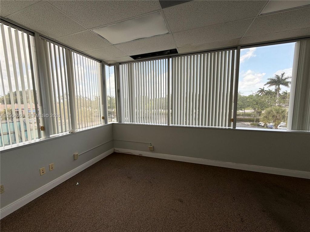 Photo of 4400 W Sample Rd #230, Coconut Creek, FL 33073 (MLS # A12004066)