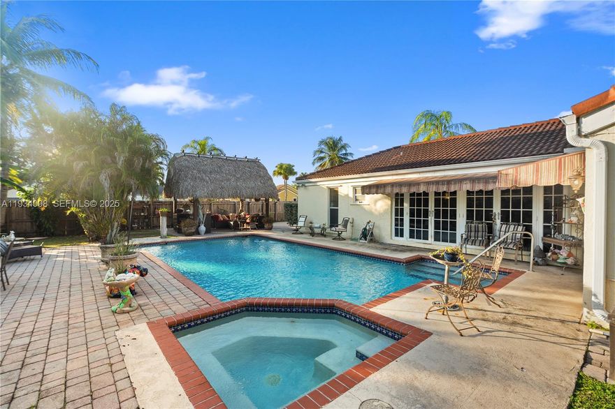 Stunning home nestled in an upscale, safe, and quiet neighborhood. This beautifully upgraded property features modern appliances, a spacious open layout, and thoughtfully remodeled bathrooms. Enjoy resort-style living with a gorgeous swimming pool, relaxing jacuzzi, and a beautifully landscaped backyard complete with a new tiki hut—perfect for entertaining or unwinding in privacy. Meticulously maintained and upgraded throughout. Priced for immediate sale—this exceptional home won’t last long!