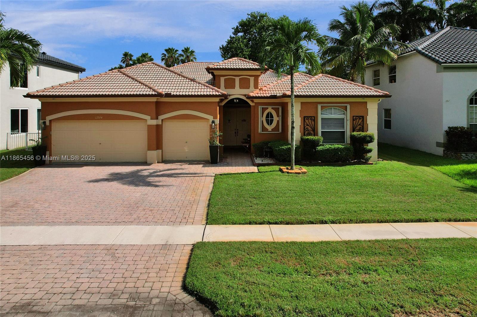 This most popular and elegant 1 story Florencia model features 4 bedrooms, 2.5 bathrooms and a 3 car garage. One garage has been converted to a room that can be used in many ways. Large and spacious with a split stack bedroom plan, double door entry into a foyer overlooking a large living room and formal dining room, volume ceilings throughout. The kitchen has an overabundance of storage, breakfast area, wood cabinetry and granite countertops. Off the kitchen is a family/game room great for family fun nights. Enter the oversized master suite through a double door entry. Large walk in closet. Master bathroom has dual sinks, roman tub and a separate shower. All the closets have closet cabinetry. The home is quipped with accordion shutters for hurricane protection. Community pool and more.
