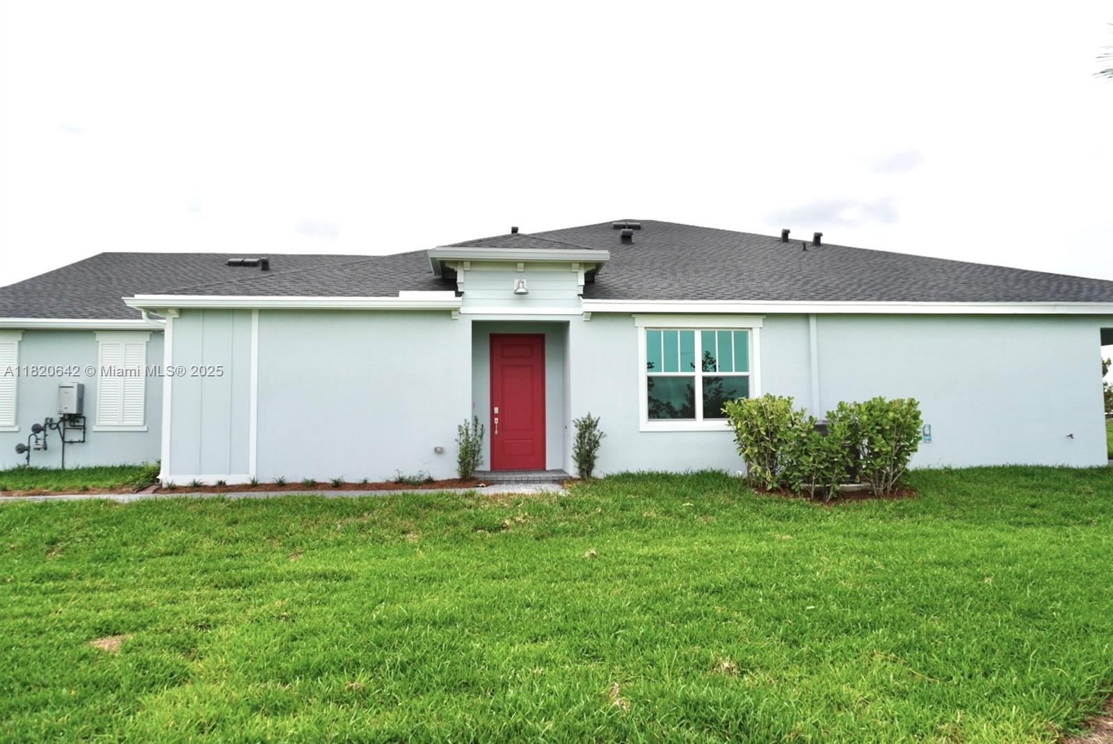 Beautiful brand-new 3-bedroom, 2-bath, 2-car garage home with 1,758 sq. ft. located in an exclusive gated community in Loxahatchee. Features a modern kitchen with stainless steel appliances, quartz countertops, center island, and designer cabinetry. The Owner’s Suite includes a walk-in closet, dual vanity, tiled walk-in shower, and upscale finishes. Ceramic tile in main living areas, high ceilings, and smart home upgrades like a smart lock. Enjoy resort-style amenities: pool, clubhouse, gym, sports courts, gardens, trails, and a scenic fishing lake. Experience the comfort, style, and peace of mind of living in a home that has never been lived in.