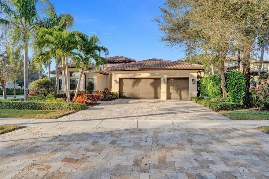 FORMER BUILDER'S MODEL! Stunning 4 BD | 3.5BA | Office | 3-Car Garage home on an oversized corner lot with lush privacy landscaping. Features a freeform pool, spa, artisan summer kitchen, and upgraded natural stone driveway, walkway, and backyard. Elegant interiors include marble floors, coffered ceilings, plantation shutters, electric shades, custom draperies, impact glass, and a gourmet kitchen with Wolf SS appliances, SubZero fridge, Bosch dishwasher, quartz counters, and a wet bar with wine fridge. Luxurious primary suite offers dual walk-in closets and a marble shower. Enjoy country club living without fees and the amenities of The Bridges: clubhouse, on-site restaurant, resort pool, gym, tennis, water park, and top schools. Near Delray Marketplace and beaches!