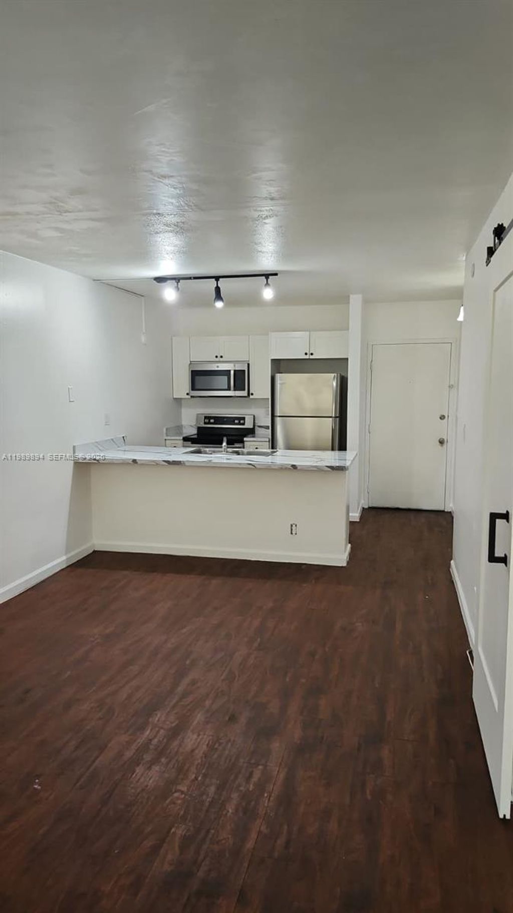 Photo of 2401 Riverside Dr #510-B, Coral Springs, FL 33065 (MLS # A11989894)