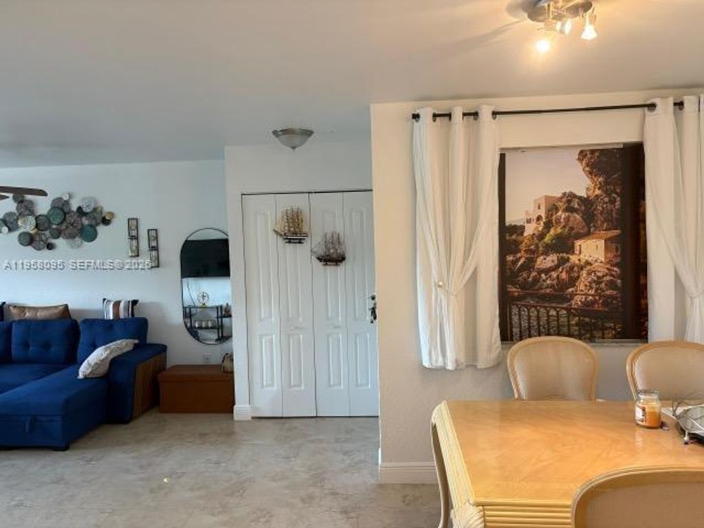 Photo of 2880 N Oakland Forest Dr #206, Oakland Park, FL 33309 (MLS # A11958095)