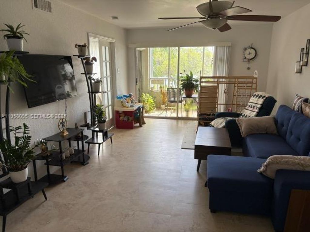 Photo of 2880 N Oakland Forest Dr #206, Oakland Park, FL 33309 (MLS # A11958095)