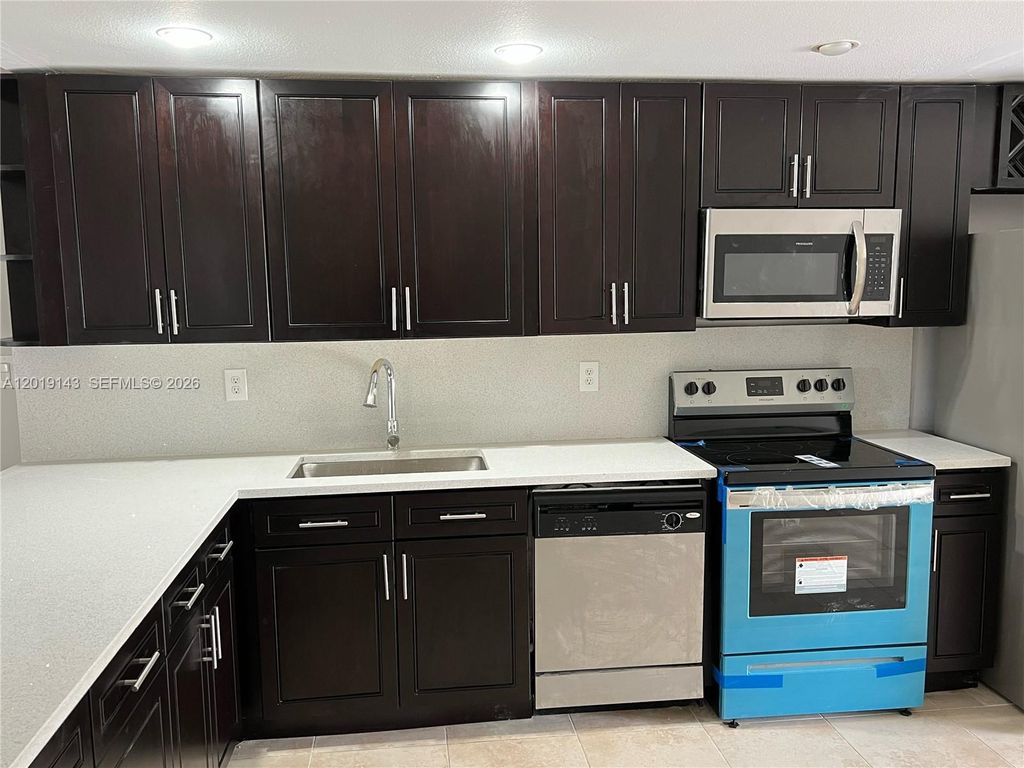 Photo of 4802 Gladiator Cir, Green Acres, FL 33463 (MLS # A12019143)