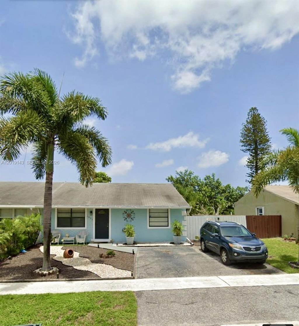 Photo of 4802 Gladiator Cir, Green Acres, FL 33463 (MLS # A12019143)