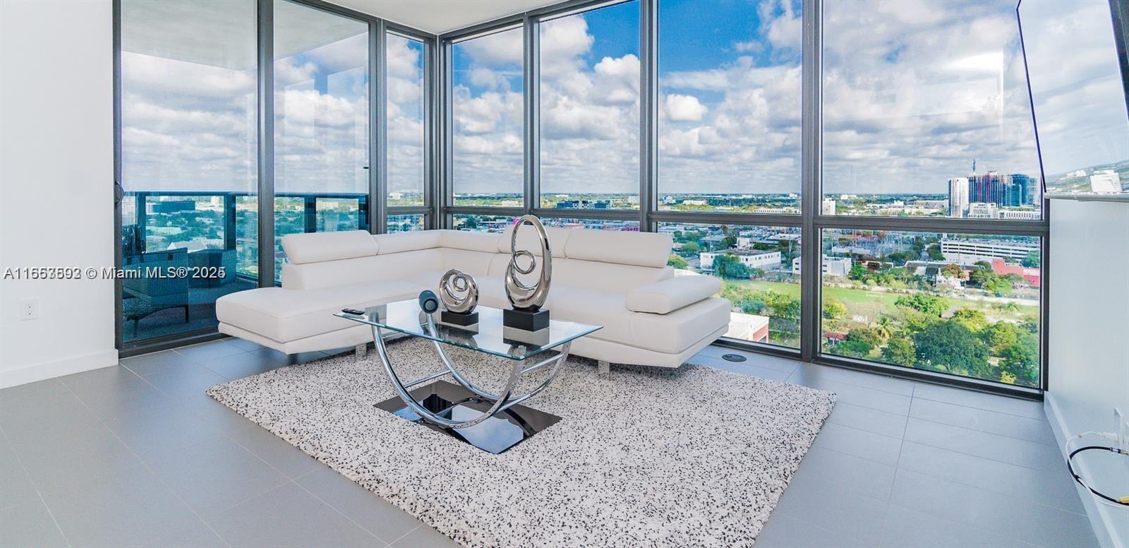 High floor corner unit, 2 bed/2 bath offering 1110 SQ FT of living space in the heart of the Arts & Entertainment District. This unit features Incredible water, sunset, and city views, and is ideally located with easy access on and off major highways. Residents enjoy over 30,000 square feet of resort-style amenities including Sunrise Pool, Sunset Pool, Rooftop Pool with Jacuzzi, expansive Sun Deck, 3,000 sqft state -of- the-art gym, Spa, Sauna and Treatment Room, Racquetball Court, Theater, Social Room, 24/7 indoor/outdoor security, concierge services, on-site management, self parking, valet service. THE OWNER IS HIGHLY MOTIVATED AND OFFERS OWNER FIANCING OPTIONS! CRYPTOCURRENCY IS ACCEPTED AS A FORM OF PAYMENT, MAKING THIS A PERFECT OPTION FOR BOTH LOCAL AND INTERNATIONAL BUYERS!!