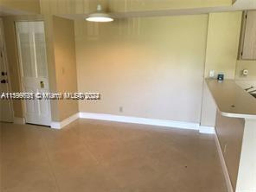 Photo of 10733 Cleary Blvd #305, Plantation, FL 33324 (MLS # A11599635)