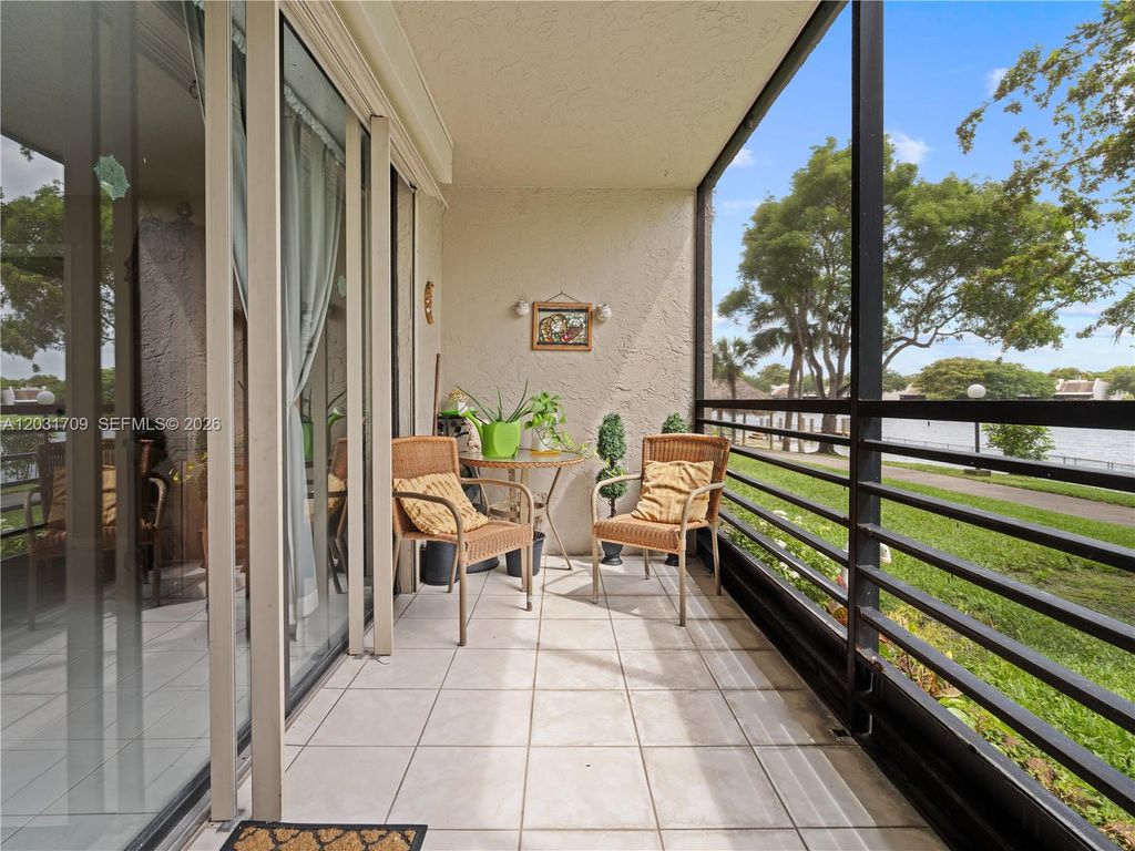 Photo of 901 Colony Point Cir #112, Pembroke Pines, FL 33026 (MLS # A12031709)