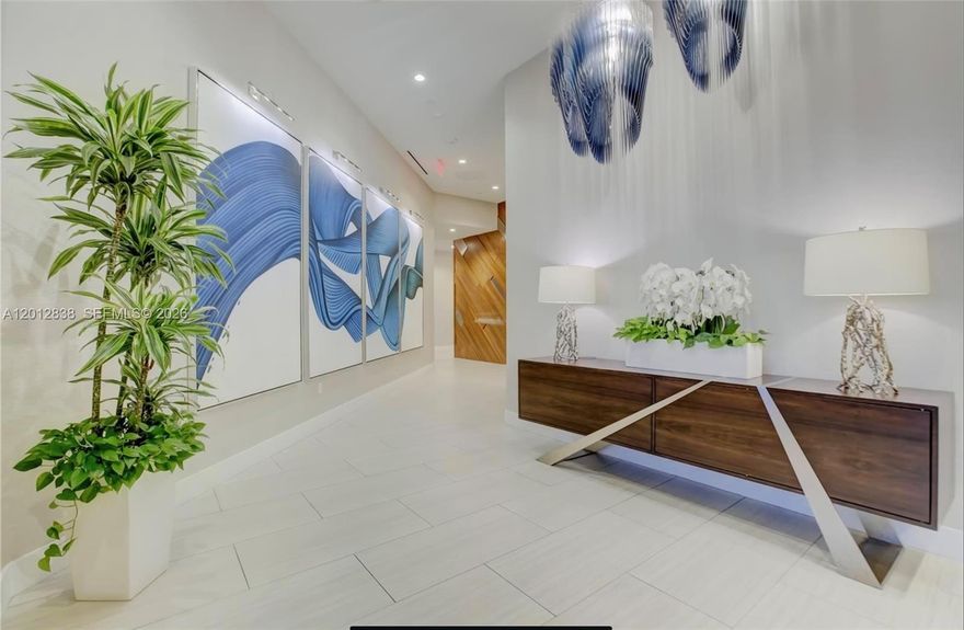 Absolute best downtown address in the heart of Ft.Lauderdale! Breathtaking views featuring 10 foot floor-to-celling windows. Split floor plan 2 bed /2.5baths + a large office/den; porcelain floor throughout, all windows feature motorised black out shades. Upgrades includes integrated home automation SONOS system for sound, TV & lighting. Kitchen equipped w Euro cabinetry, Jenn-Air stainless appliances & quartz countertops/backsplash, wine cooler. Bedrooms feature built-in custom closets. Unit sold fully furnished & turn-key! Parking ASSIGNED side by side space, one is which is /EV CHARGING SPACE. Five-star resort-style amenities; rooftop pool, cabanas, fitness center, grills, club room, restaurants, 24hr doorman/security, valet service. Rapid HOA approval. Text Agent for showings