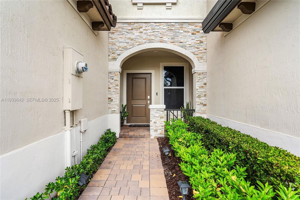 Photo of 2781 NW 55th Way, Lauderhill, FL 33313 (MLS # A11933642)