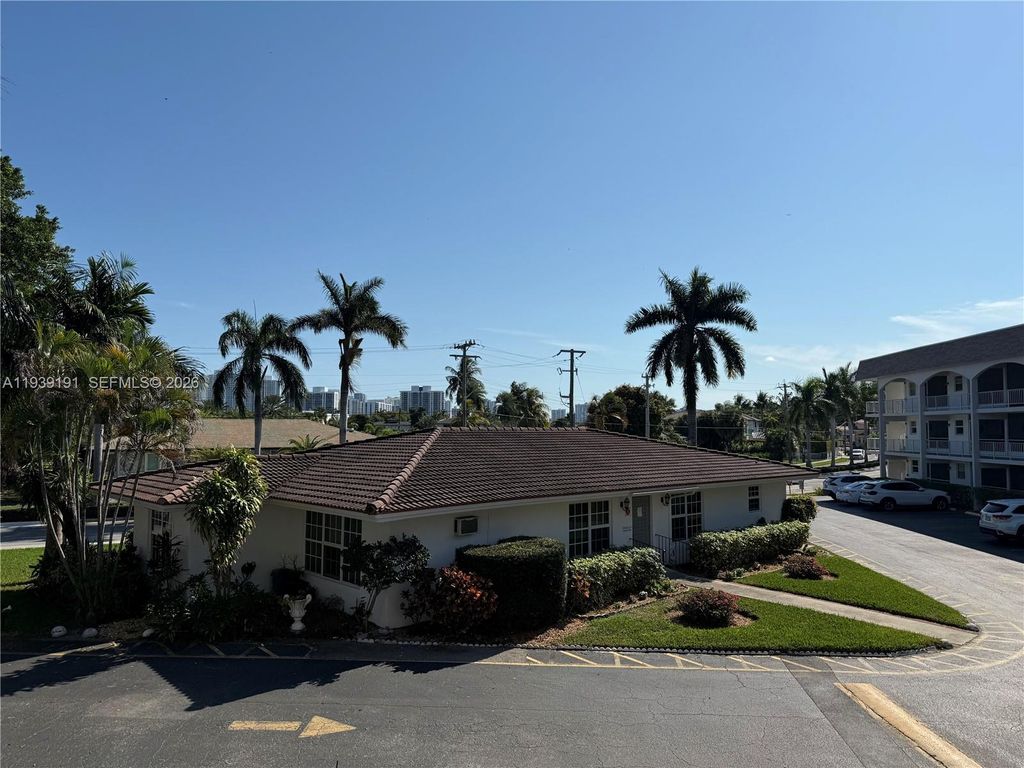 Photo of 581 Blue Heron Dr #318-B, Hallandale Beach, FL 33009 (MLS # A11939191)