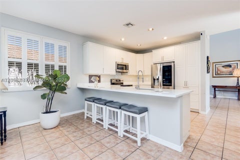 Photo of 1280 Majesty Ter, Weston, FL 33327 (MLS # A12098837)