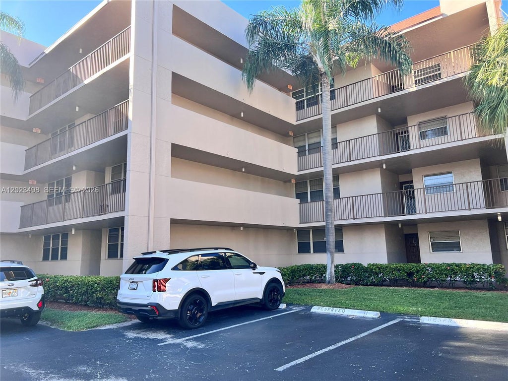 Photo of 9531 Seagrape Dr #202, Davie, FL 33324 (MLS # A12023498)