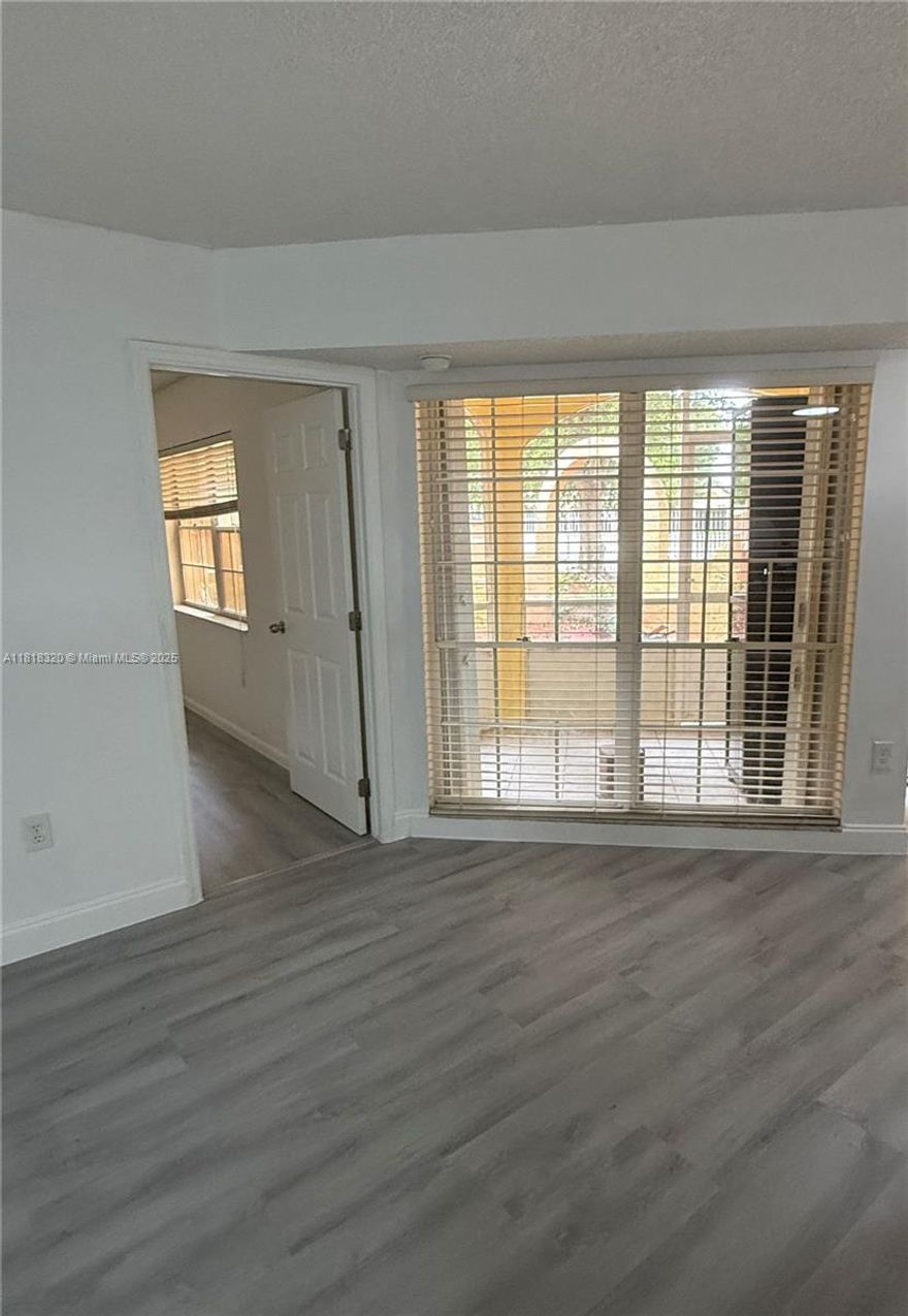 Beautiful ground floor corner apartment featuring 2 bedrooms, 2 baths, private screened front porch. Enjoy brand new flooring, fresh paint, washer/dryer, new stove and other extras. The layout offers privacy with bedrooms on opposite ends and kitchen, dining an living areas in the center. Located in an excellent schools district, just half block from grocery store, restaurants, gas station and close distance to hospitals, public transportation and parks. Area: SW 157 Ave & 72 Street, Kendall Miami.