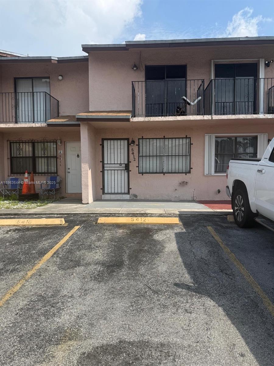 This is a very well maintained 2 bedroom and 1.5 baths unit with fenced patio and 2 assigned parking spaces in front of the property. Conveniently located in the west of Hialeah within minutes to schools and shopping. Easy access to Palmetto Expressway and Florida Turnpike. Unit is in perfect condition, including washer and dryer and is located. Low HOA. Come see for yourself it won't disappoint whether you are an investor or want to live in!!!!