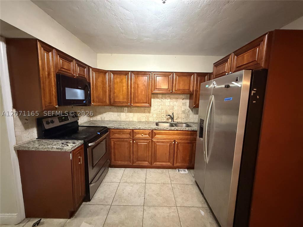 Photo of 2751 N 66th Ave, Hollywood, FL 33024 (MLS # A12071165)
