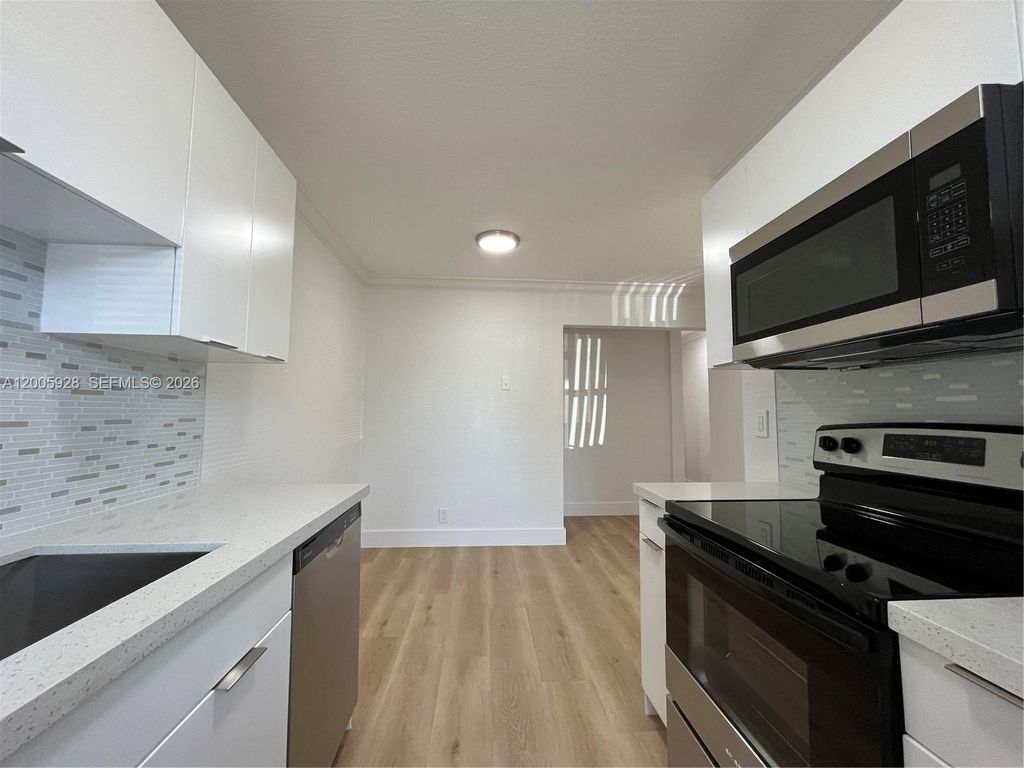 Photo of 6301 SW 20th St #6301, North Lauderdale, FL 33068 (MLS # A12005928)