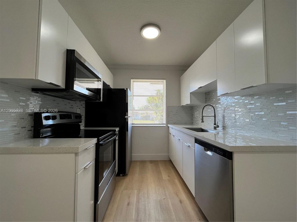 Photo of 6301 SW 20th St #6301, North Lauderdale, FL 33068 (MLS # A12005928)