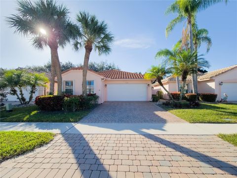 Photo of 5136 Pelican Cove Dr, Boynton Beach, FL 33437 (MLS # A11909260)