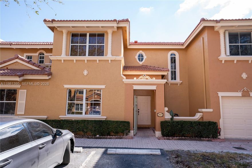 Welcome to this stunning 3-bedroom, 2.5-bathroom condo townhome in the heart of Miami Lakes, nestled within the gated community of Villa Vizcaya. This 1,450 sq ft end-unit features a fresh modern vibe with recent updates: a brand-new roof, freshly painted interior, tile flooring on the first floor, warm wood floors on the second, and modern cabinetry for a perfect blend of style and comfort.

The open-layout design is ideal for relaxing or entertaining, with a spacious kitchen boasting stainless steel appliances. The split floor plan offers excellent privacy—the master suite (with en-suite bathroom, washer, dryer, and refrigerator) is on one side, while the other two bedrooms are on the opposite side.

This turnkey property is ready for immediate move-in and includes all appliances. Additional perks: welcoming front porch, in-unit laundry, assigned parking, and the motivated seller is eager to assign the property (submit offers today!). HOA includes sleek glass railings, community pool area, park, and low monthly fee of $230. Conveniently located close to highways, shopping, dining, and top-rated schools nearby