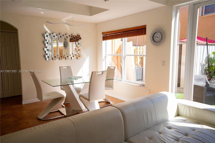 Welcome to this stunning 3-bedroom, 2.5-bathroom condo townhome in the heart of Miami Lakes, nestled within the gated community of Villa Vizcaya. This 1,450 sq ft end-unit features a fresh modern vibe with recent updates: a brand-new roof, freshly painted interior, tile flooring on the first floor, warm wood floors on the second, and modern cabinetry for a perfect blend of style and comfort.

The open-layout design is ideal for relaxing or entertaining, with a spacious kitchen boasting stainless steel appliances. The split floor plan offers excellent privacy—the master suite (with en-suite bathroom, washer, dryer, and refrigerator) is on one side, while the other two bedrooms are on the opposite side.

This turnkey property is ready for immediate move-in and includes all appliances. Additional perks: welcoming front porch, in-unit laundry, assigned parking, and the motivated seller is eager to assign the property (submit offers today!). HOA includes sleek glass railings, community pool area, park, and low monthly fee of $230. Conveniently located close to highways, shopping, dining, and top-rated schools nearby