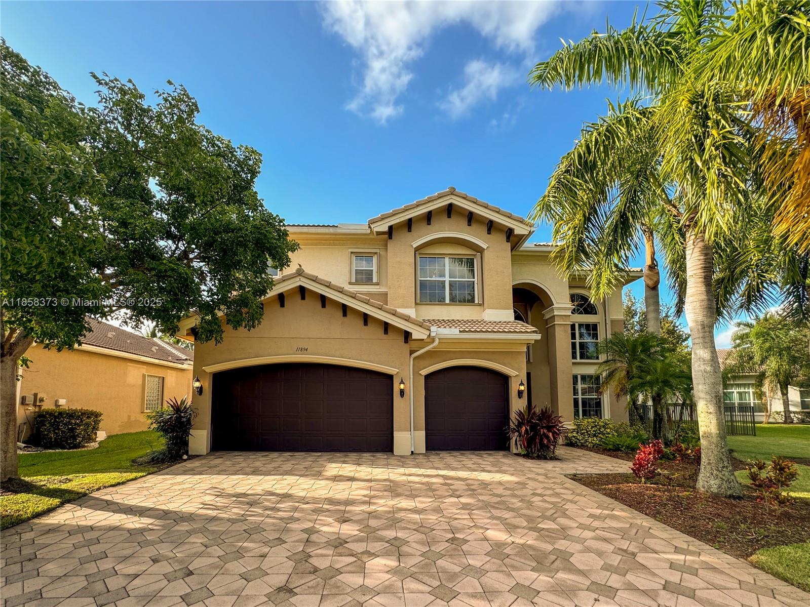 Elegant lakefront home in sought-after Canyon Springs. Features a grand staircase, bay windows, spacious kitchen with island, and breakfast nook. Primary suite offers French doors to a private balcony. Loft overlooks formal living/dining rooms. Tinted windows for light and energy efficiency. Large backyard with mango tree—perfect for entertaining.