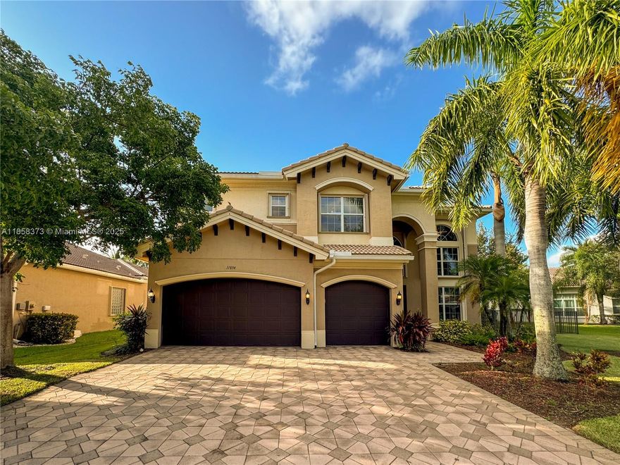 Elegant lakefront home in sought-after Canyon Springs. Features a grand staircase, bay windows, spacious kitchen with island, and breakfast nook. Primary suite offers French doors to a private balcony. Loft overlooks formal living/dining rooms. Tinted windows for light and energy efficiency. Large backyard with mango tree—perfect for entertaining. All carpet will be replaced with wood floor within two weeks.