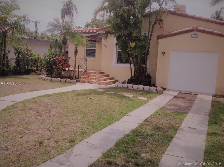 Charming 3-bedrooms 2-bath single family home plus Cottage in back of property.  Main house featuring split bedrooms, original wood floors throughout except in family/open kitchen area.  Large windows, newer roof with barrel tile, new air handler, new dishwasher, freshly painted inside.  Huge fenced yard.  Last 5-pictures for cottage.