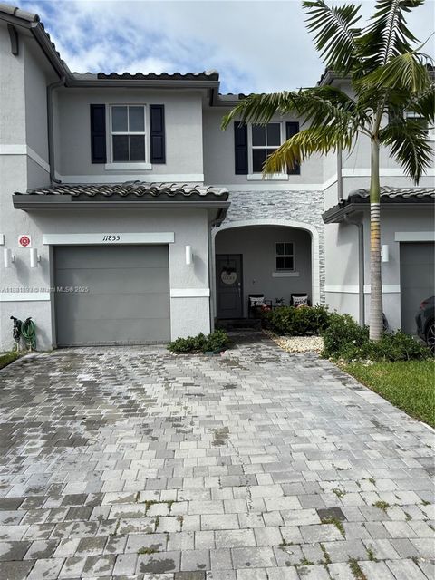Photo of 11855 NW 46th St, Coral Springs, FL 33076 (MLS # A11881893)
