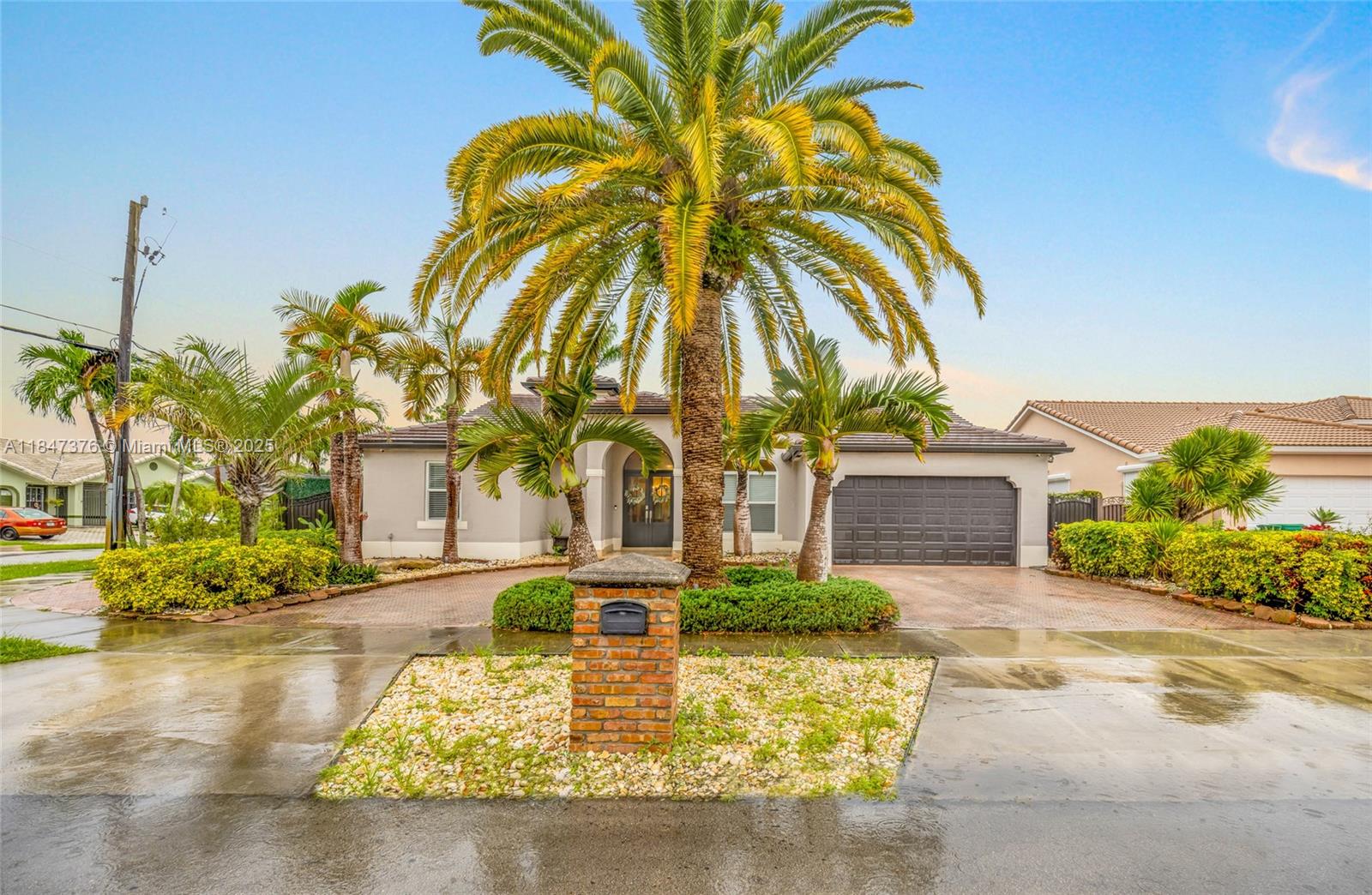 Fully Remodeled 4BR/3BA on Corner Lot with In-Law Suite. This beautifully updated home features a spacious split floor plan with vaulted ceilings, formal living and dining rooms, and a large family room. Enjoy a remodeled kitchen that flows seamlessly into the main living areas—perfect for entertaining. Property includes a circular driveway, impact windows and doors, new roof, and two central A/C units. The backyard is a private oasis with a covered terrace, ceiling fans, and a resort-style heated pool with ample deck space. Gated side entrance with electric gate (fits RV or boat) Detached A/C shed for storage or hobbies. Exterior camera system included. Move-in ready with every detail thoughtfully updated. Chandelier not included.