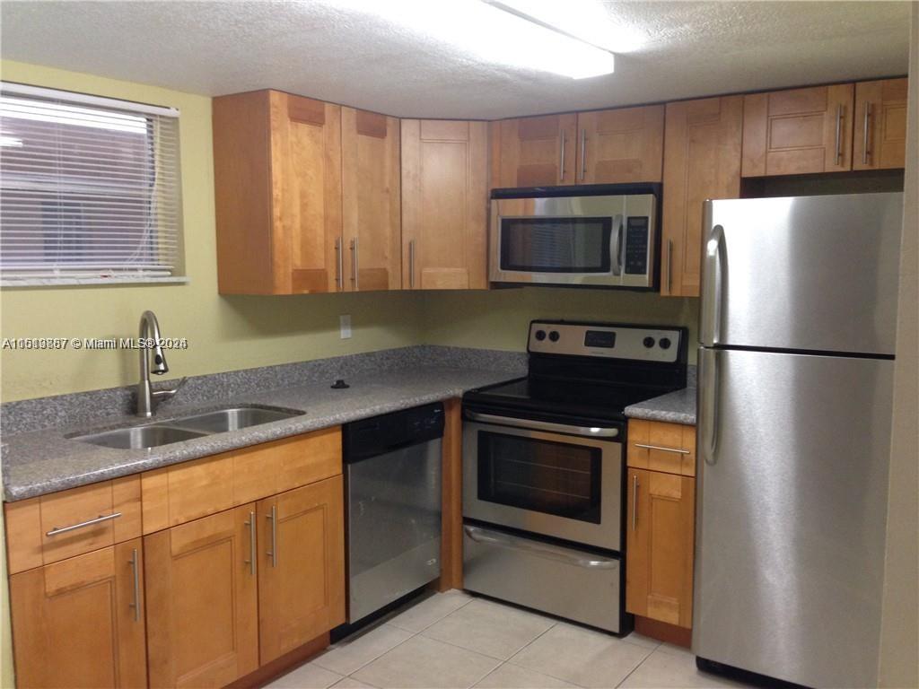 Nice and big 2/2 unit, kitchen with stained steel appliances, Living room is light and bright, and leads to your own screened in patio with canal view. Bedrooms with laminate floors. Master bedroom features a large walk in closet with additional 2nd closet. Very quiet community! Community laundry room close by and features a pool, tennis courts, & fitness room. Complex is centrally located close to everything: major highways, shopping, and dining just minutes away.