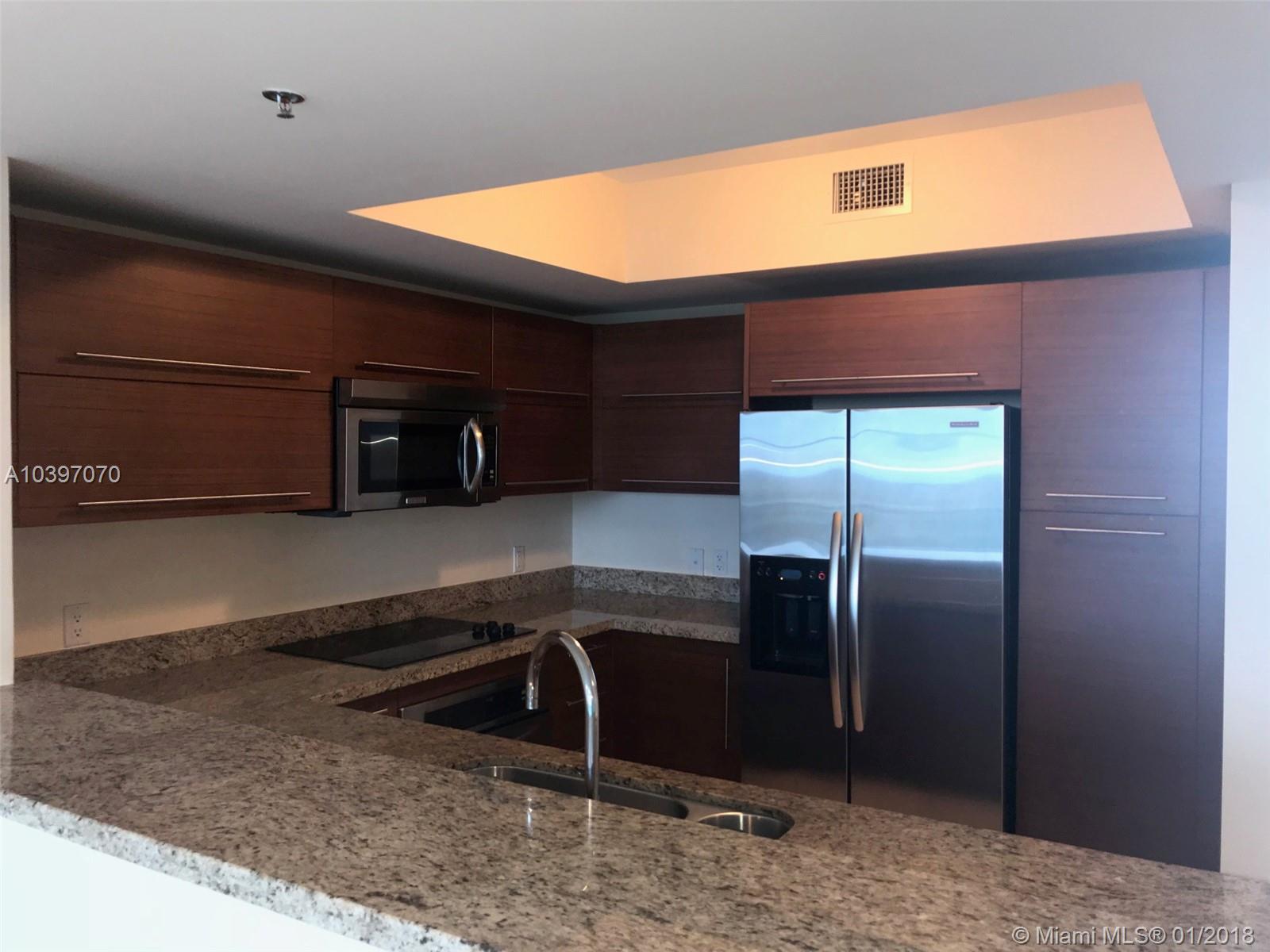 Easy to show. Vacant. Resort style living in this spacious 2 bedroom, 2 bathroom plus a big Den Condo right next to Sawgrass Mall. Beautiful sunset view from the master bedroom and living room and beautiful sunrise views from the 2nd bedroom and DEN. The building offers an incredible pool, BBQ area, an amazing complete GYM, business center, beautiful lobby overlooking the pool and lake. Very well located right next to Sawgrass mall, I-595 expressway, I-75.