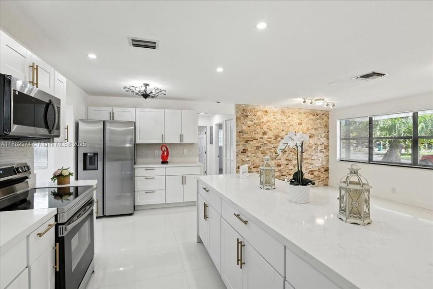 $5,000.00 CREDIT towards Closing Cost!!!!Stunning Pool Home in Cooper City. Prepare to fall in love with this beautifully remodeled residence. The home features 3 bedrooms, 2 bathrooms, a laundry room, a pool, and an oversized yard overlooking the canal. Step into the brand-new kitchen with sleek contemporary cabinetry, state-of-the-art appliances, and gorgeous countertops. The open layout seamlessly connects the kitchen to the inviting living area, ideal for entertaining or relaxing. Outside, a private backyard awaits, perfect for sun-filled days or hosting gatherings with friends and family. Enjoy the inviting pool on hot summer days or relax by the water—it's your private oasis. A+ schools—a must see.