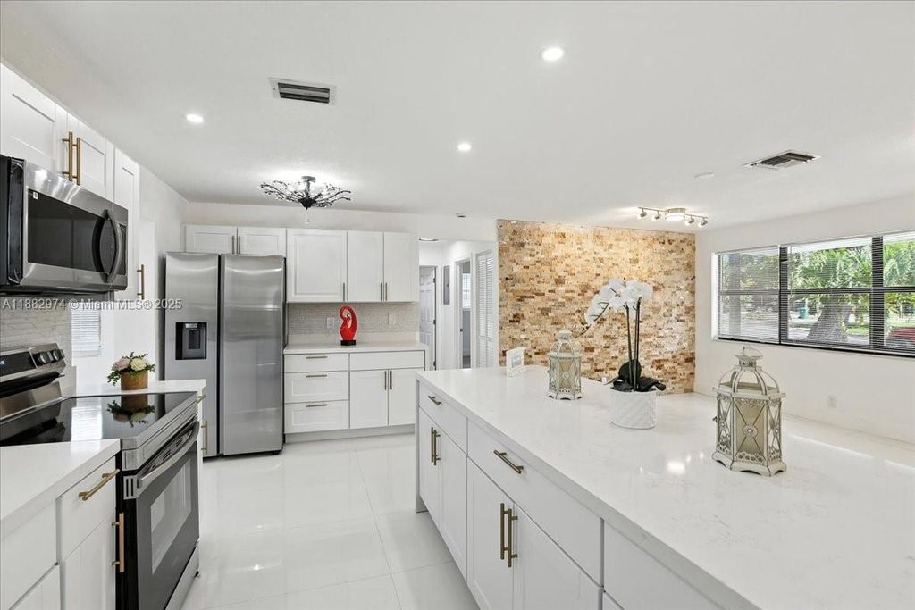 Photo of 9207 SW 49th Pl, Cooper City, FL 33328 (MLS # A11882974)