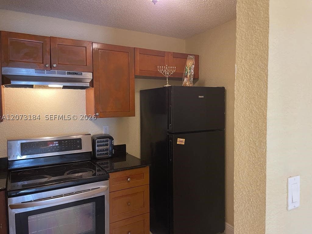 Photo of 4251 NW 5th St #112, Plantation, FL 33317 (MLS # A12073184)