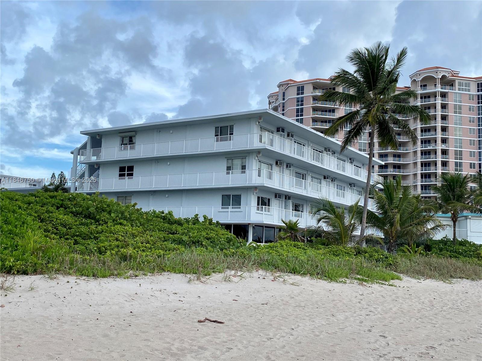Nicely updated studio located in The International Studio Condominium, a beachfront community. Studio is offered fully furnished with a king size Murphy bed, sofa, coffee table, dresser, bar stools and a television. Unit is located on the first floor with a view of the pool. Kitchen is fully equipped with a refrigerator, range and microwave. Rent includes water and electricity. Laundry facilities are located on each floor. One assigned parking space is included. Community is gated and has direct access to the beach.