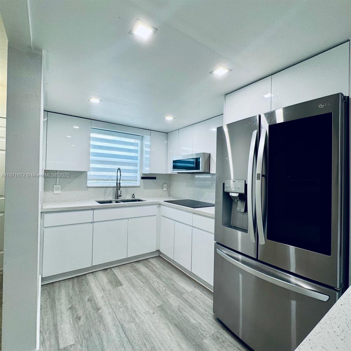 Beautiful and fully remodeled 2-bedroom, 1.5-bath townhouse located in West Hialeah Gardens area — just minutes from Westland Mall, Miami Dade College, top-rated schools, parks, and major shopping centers. Private patio, In-unit washer and dryer, Modern kitchen with induction cooktop, 2 assigned parking spaces. Ready for immediate move-in