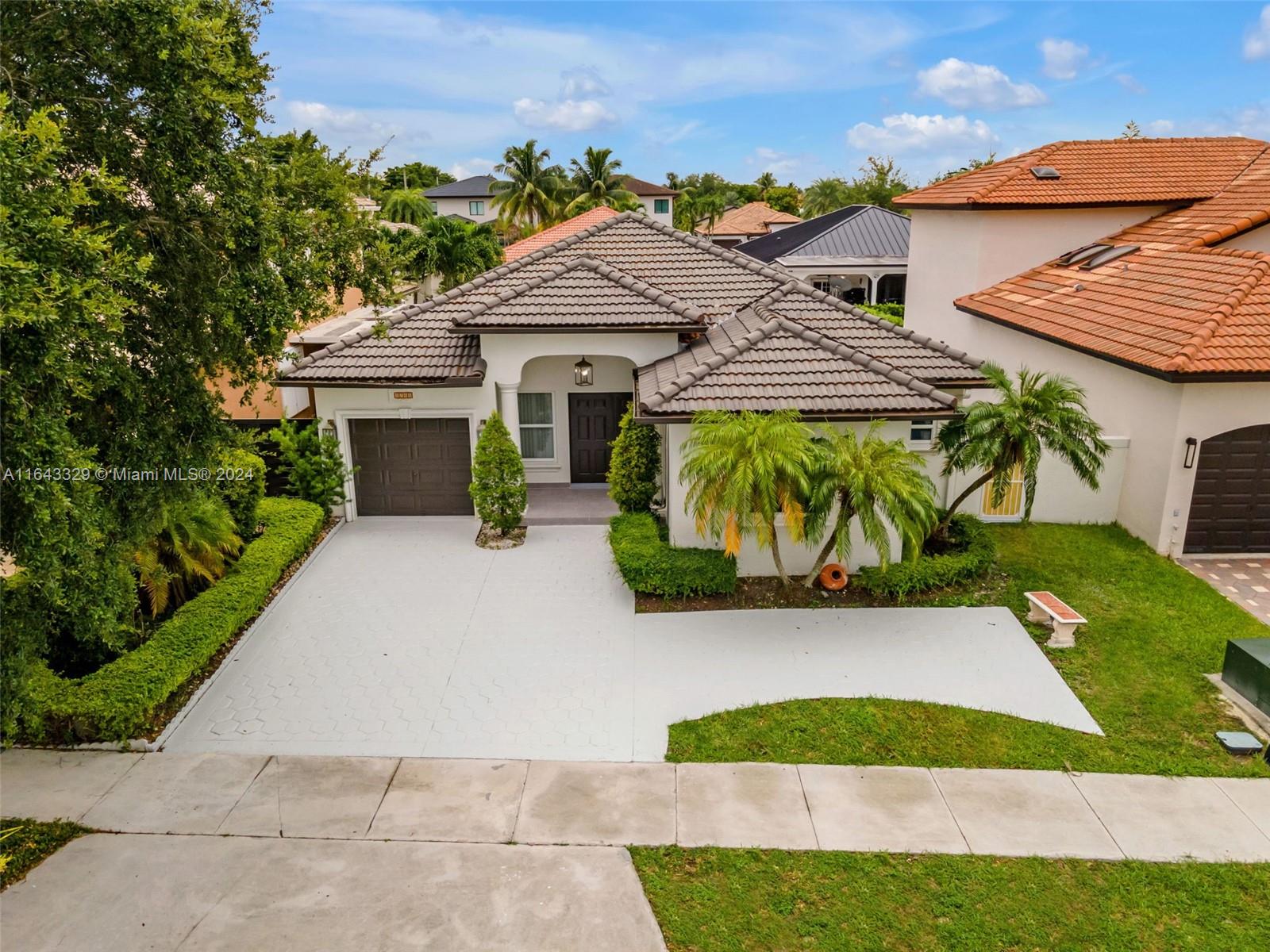 Welcome to this wonderful opportunity to rent this Miami Lakes home with 3 bedrooms, 2 bathrooms, and a spacious garage. This home features an outdoor covered terrace with brand new tile, and also a front porch with brand new tile. Inside the home you'll find charming chandeliers, stainless steel appliances, washer & dryer, walk-in closets, renovated bathrooms, and impact windows & doors.