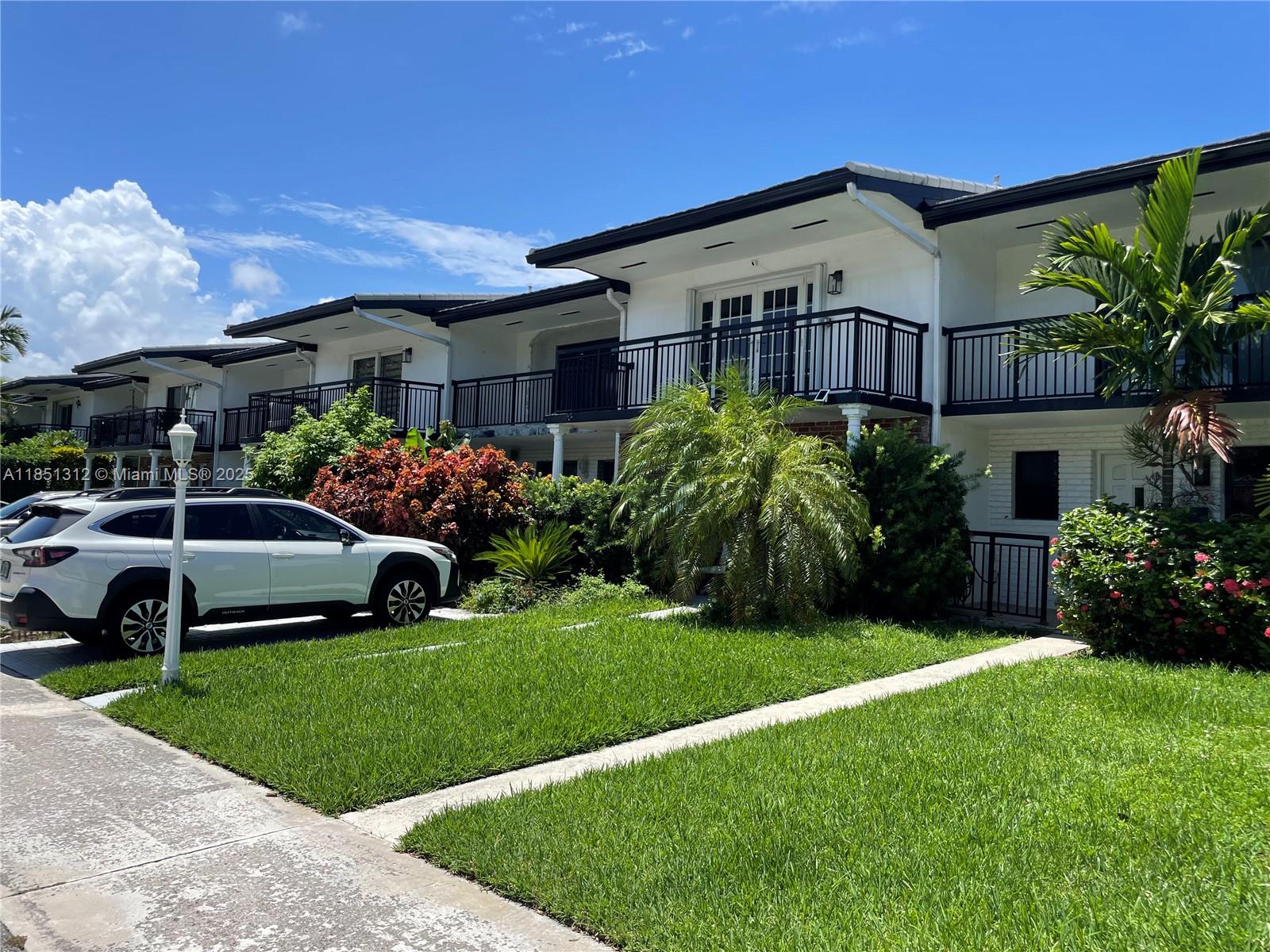Beautifully remodeled 2BR/2.5BA townhouse in the heart of North Miami! This bright and spacious home offers a functional floor plan with a large living/dining area that opens to a private fenced patio—perfect for entertaining or relaxing. Upstairs you'll find two generously sized bedrooms, each with its own private bathroom and ample closet space. The updated kitchen features plenty of cabinet storage plus a pantry. Bathrooms have been tastefully remodeled, and there's a convenient powder room on the main floor. Additional features include a whole-house water softener system and a Ring video doorbell/security system. Prime location—just steps to Whole Foods, shops, restaurants, and places of worship. Minutes away from the beach and Aventura Mall. A must-see!