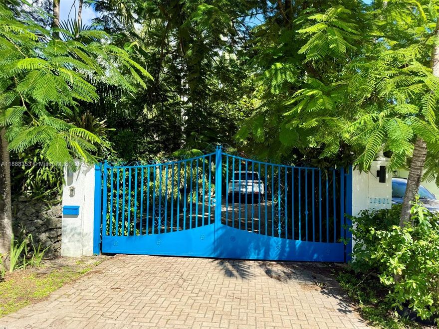 Prepare to be transported back in time to this extraordinary 1940's Miami 1/1 tropical dollhouse with detached 1/1 guest house.  Larger than indicated on tax rolls (estimated at apprx. 1200 sq ft living area) because of the garage conversion (which was done without permit). This mid-20th century time machine will propel you back to a simpler time of lush, private gardens, gated coral walls, Dade county pine ceilings, ornamental solid wood doors and mossy coral steps and into a dramatic snapshot dripping in artistic history. More like a museum than a home, the flair for the dramatic is apparent everywhere. Plenty of room to expand, this mid-century masterpiece is awaiting your personal touches. 

(General disclaimer: Buyers should not rely on any representations and should do their own due diligence on this or any property.)