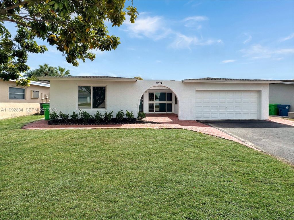 Photo of 9574 NW 19th Pl, Sunrise, FL 33322 (MLS # A11992884)